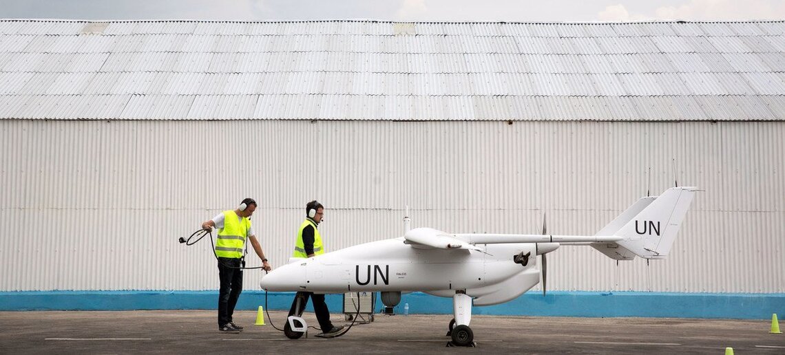 An unmanned aerial vehicle or drone is prepared for flight in Goma, in the Democratic Republic of the Congo.