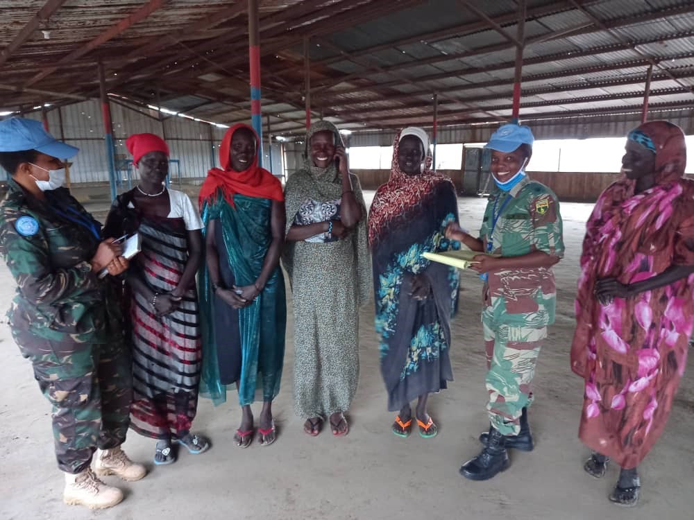 Following reports of sexual and gender-based violence against women collecting firewood in Rubkona, South Sudan, Captain Irene Wilson Muro and and Major Winnet Zharare reached out to local women to discuss ways to prevent this abuse. (Photo: UNMISS.)