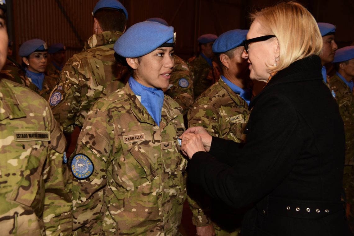 2 February 2017, Cyprus: Former UN Special Representative Elizabeth Spehar decorates one of 226 recipients of the UN Medal in a Service of Peace ceremony. UNFICYP/Ludovit Veres