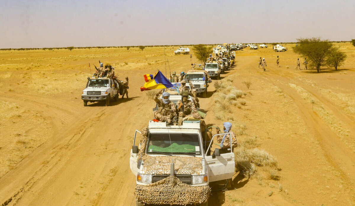 Vehicles in a desert landscape