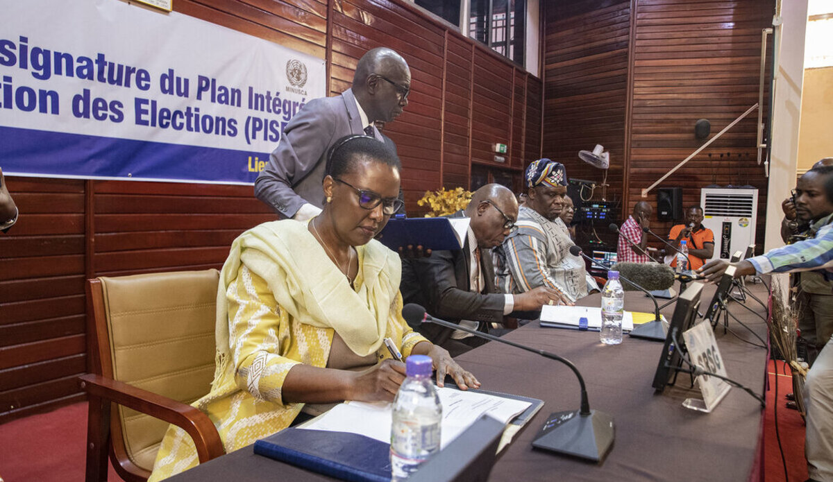 Special Representative of the Secretary-General for the Central African Republic and Head of MINUSCA, Valentine Rugwabiza, signing the Integrated Election Security Plan (PISE) during a ceremony in Bangui. (Photo: MINUSCA)