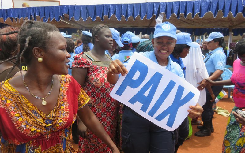 Peacekeepers attend an event with women from the Central African Republic calling for peace 