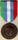 A medal was established in August 1996 and has five equal bars. The center is white, representing peace, flanked by UN blue on either side; on the left is a stripe of light green, representing the forests in Spring in Bosnia-Herzegovina, and, on the right, a red colour symbolizing the sunrise over the mountains of this country. Ninety days of service are required for qualification.