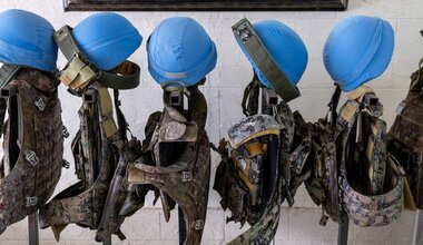 Blue helmets and bulletproof vests belonging to peacekeepers serving with United Nations Interim Force In Lebanon (UNIFIL).