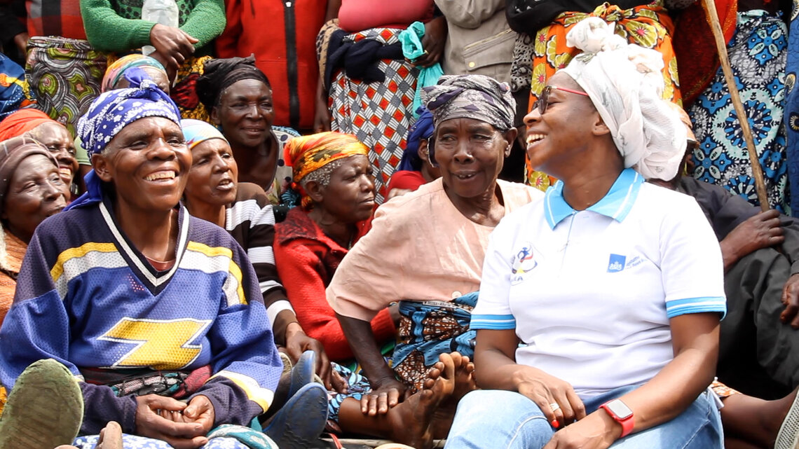 Anny speaks with a group of women at Kanyaruchinya camp in the Democratic Republic of the Congo. Photo by: Alain Wandimoyi/MONUSCO